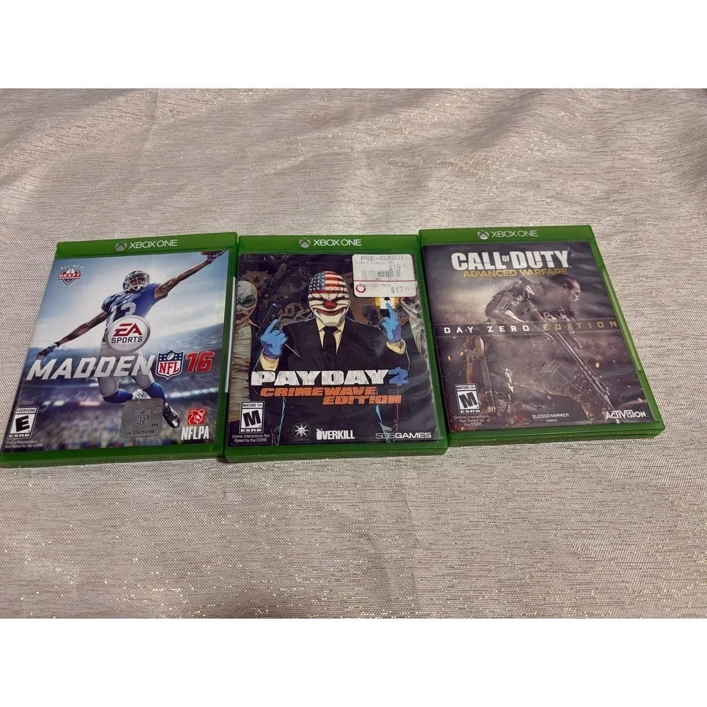 three Xbox One video games Payday, call of duty ,madden